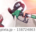 Pumping fuel at a gas station, close-up shot. 138724863