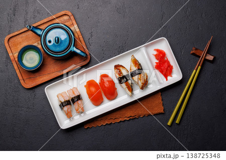 Sushi set with tea and small teapot Sushi set with tea and small teapot 138725348