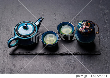 Asian tea ceremony set with teapot and cups Asian tea ceremony set with teapot and cups 138725351