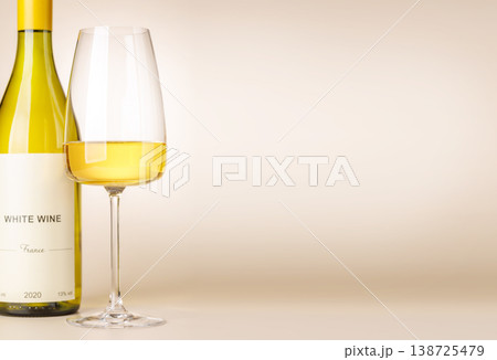 White wine bottle mockup with glass 138725479