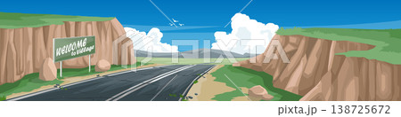 Horizontal or landscape view of asphalt road on hills to village. Sits on a hillside with small cliffs on both sides with Welcome Sign board. Background of road on meadow and mountain under the sky. 138725672