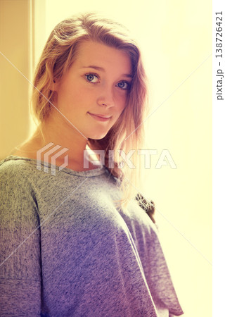 Portrait, beauty and a young woman in her home to relax on the weekend during a summer morning. Innocent face, calm and retro sunlight with a casual gen z person chilling alone in her apartment Portrait, beauty and a young woman in her home to relax on the weekend during a summer morning. Innocent face, calm and retro sunlight with a casual gen z person chilling alone in her apartment 138726421