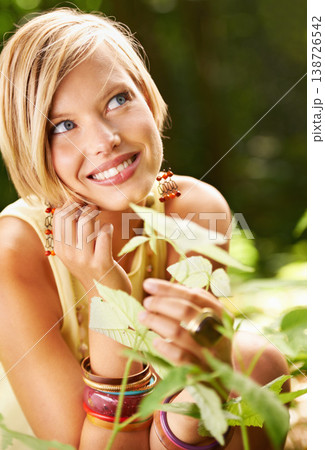 Happy woman, garden and plant with thinking, relax and calm outdoor in a forest with smile. Female person, grass and nature in summer with vacation and holiday with green woods with an idea in sun 138726542