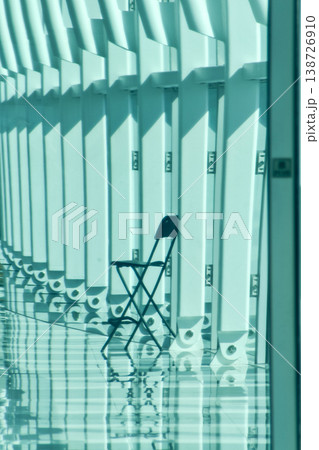 A chair in the corridor with sunlight. Interiors design. Building abstract. A chair in the corridor with sunlight. Interiors design. Building abstract. 138726910