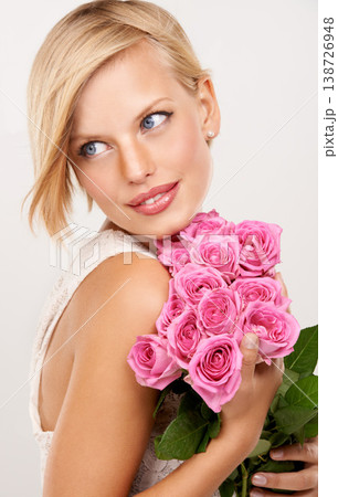 Flowers, bouquet and rose with woman in studio for floral, valentines day and romance gift. Plants, beauty and happy with face of female person on white background for elegant, love and present 138726948