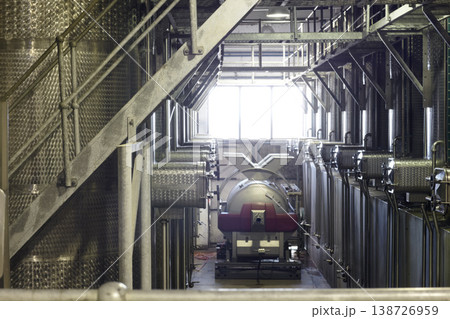 Background, wine factory and tank equipment for alcohol, whiskey and beer production, manufacturing and industry. Warehouse, steel container and industrial machine in winery, distillery and brewery Background, wine factory and tank equipment for alcohol, whiskey and beer production, manufacturing and industry. Warehouse, steel container and industrial machine in winery, distillery and brewery 138726959
