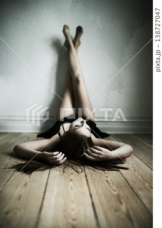 Legs up on wall, relax and woman lying on a floor for peaceful, relax or moment in her home. Ground, chilling or female person laying down in a house for body relaxation, circulation or calm position Legs up on wall, relax and woman lying on a floor for peaceful, relax or moment in her home. Ground, chilling or female person laying down in a house for body relaxation, circulation or calm position 138727047
