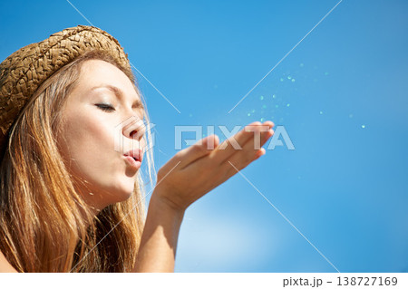 Mockup, blue sky and a woman blowing glitter for celebration, event or a party in the city. Shimmer, closeup and a young girl with confetti or sparkle for a trend, wish or hope from a funky hipster Mockup, blue sky and a woman blowing glitter for celebration, event or a party in the city. Shimmer, closeup and a young girl with confetti or sparkle for a trend, wish or hope from a funky hipster 138727169