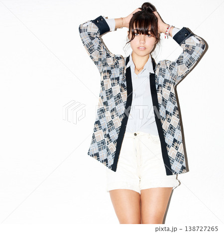 Fashion, beauty and portrait of woman on a white background with pride, confidence and glamour. Cosmetics, hand gesture and isolated person in trendy clothes, casual outfit and style in studio Fashion, beauty and portrait of woman on a white background with pride, confidence and glamour. Cosmetics, hand gesture and isolated person in trendy clothes, casual outfit and style in studio 138727265