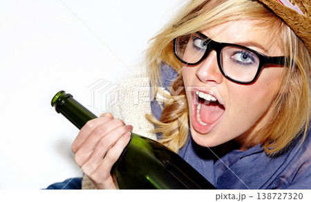 Champagne, drunk or portrait of woman screaming in studio for a fun celebration, party or event. Face, shouting or wild person drinking alcohol or beverage in bottle for New Year on white background Champagne, drunk or portrait of woman screaming in studio for a fun celebration, party or event. Face, shouting or wild person drinking alcohol or beverage in bottle for New Year on white background 138727320