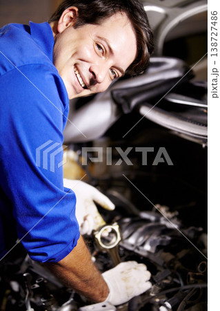 Portrait, smile and mechanic check oil on engine of car, repair and maintenance. Face, technician and happy man on motor vehicle, fixing transport or auto service inspection at shop of professional 138727486