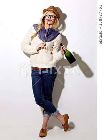 Portrait, woman and holding moustache with champagne for photo or comic on a white background for fun. Funny, alcohol and girl with a prop at an event for crazy, comedy and celebration for a picture Portrait, woman and holding moustache with champagne for photo or comic on a white background for fun. Funny, alcohol and girl with a prop at an event for crazy, comedy and celebration for a picture 138727761