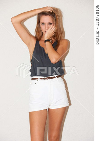 Fashion, hipster and portrait of woman with attitude, pride and confidence on a white background. Attractive, aesthetic and isolated person in trendy clothes, casual outfit and stylish in studio 138728106
