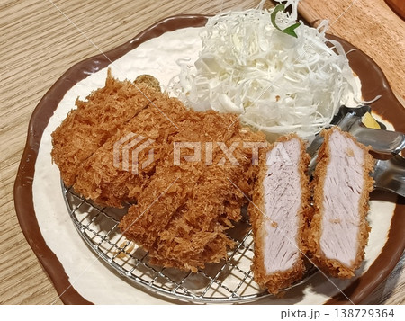 Classic Japanese Tonkatsu Set with Shredded Cabbage on Wire Rack Classic Japanese Tonkatsu Set with Shredded Cabbage on Wire Rack 138729364