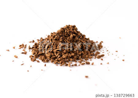 Instant coffee granules pile isolated Instant coffee granules pile isolated 138729663