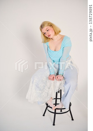 quiet portrait white woman sitting on stool thoughtful quiet portrait white woman sitting on stool thoughtful 138729891