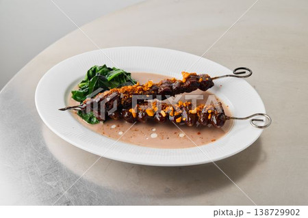 Sophisticated dish with crispy nuts and fresh vegetables 138729902