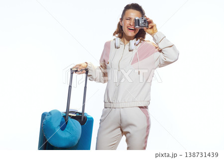 Stylish Traveler Capturing Memories with Vintage Camera 138731439
