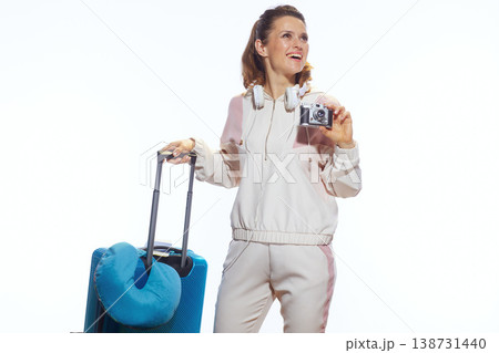 Woman Inspired for Adventure with Suitcase and Camera Woman Inspired for Adventure with Suitcase and Camera 138731440