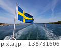 Swedish flag on ferry near bridge between Styrso and Donso islands of Gothenburg archipelago, Gothenburg Minucipality, Vastra Gotaland County, Sweden, sunny day 138731606