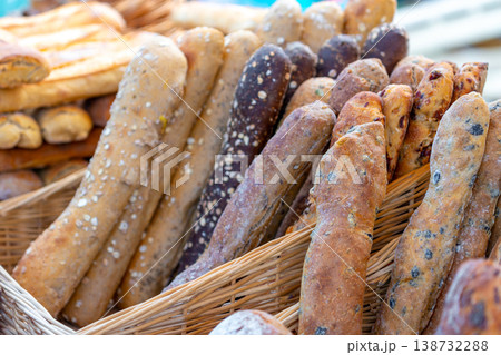 Different types of bread displayed at a street market. Food Different types of bread displayed at a street market. Food 138732288