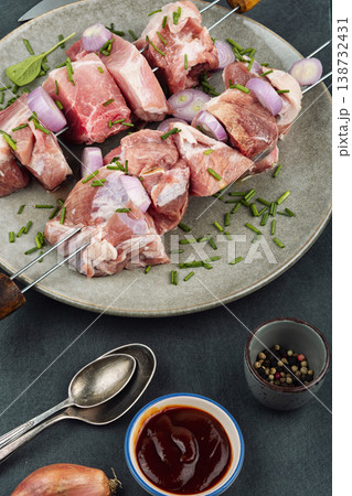 Traditional pork shashlik skewers with onion and herbs Traditional pork shashlik skewers with onion and herbs 138732431