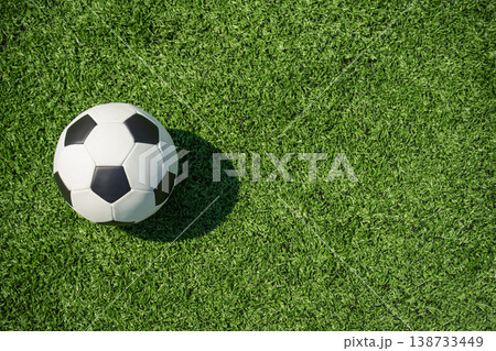 Top view soccer ball on green grass minimal sport background 138733449