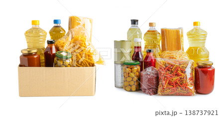 Foodstuffs in donation box isolated on white background for volunteer to help people. Foodstuffs in donation box isolated on white background for volunteer to help people. 138737921