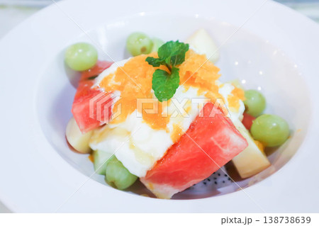 fruit salad with yogurt topping or watermelon , apple and grape salad 138738639