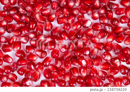 Vivid and reflective pomegranate seed pattern suitable for promotional use. Dynamic and shining pomegranate seed mosaic ideal for packaging and social media applications 138739220
