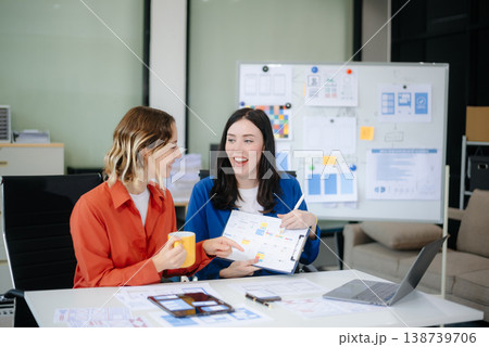 Woman people meeting team brainstorming on their project with laptop, smartphone and digital tablet. Woman people meeting team brainstorming on their project with laptop, smartphone and digital tablet. 138739706