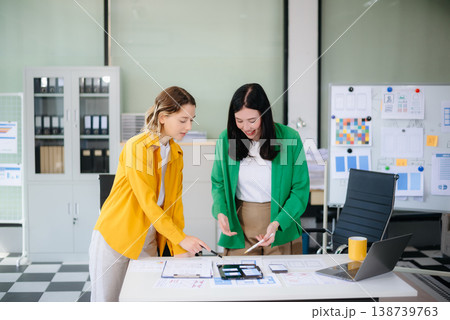 Woman people meeting team brainstorming on their project with laptop, smartphone and digital tablet. Woman people meeting team brainstorming on their project with laptop, smartphone and digital tablet. 138739763