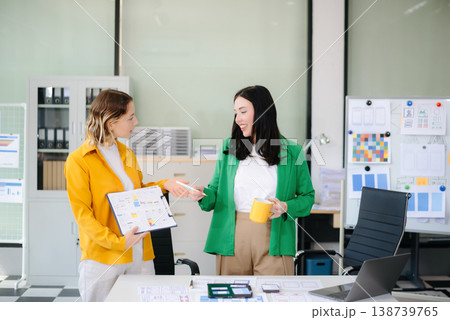 Woman people meeting team brainstorming on their project with laptop, smartphone and digital tablet. Woman people meeting team brainstorming on their project with laptop, smartphone and digital tablet. 138739765