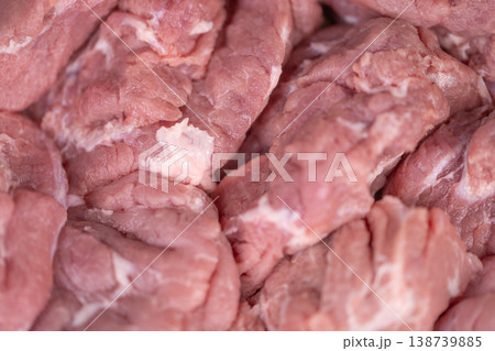 Chilled pork with icy coating. Meat preserved by cold chain refrigeration. Frosted raw pork displaying icy surface that signifies proper cold storage and preservation Chilled pork with icy coating. Meat preserved by cold chain refrigeration. Frosted raw pork displaying icy surface that signifies proper cold storage and preservation 138739885