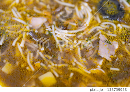 Rich mushroom broth. Hearty earthy mushroom soup. Robust mushroom and herb broth with hearty noodles. Comforting mushroom soup infused with herbs and substantial noodles 138739938