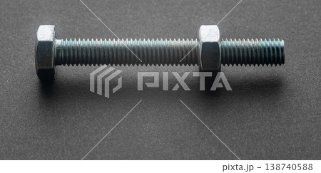 construction bolt close-up on a black background 138740588