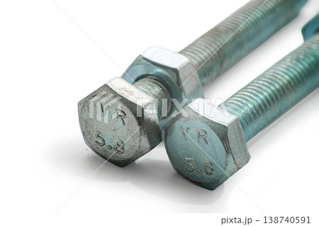 construction bolts close-up on a white isolated background construction bolts close-up on a white isolated background 138740591