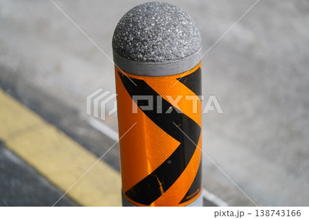 Road Safety Bollard Orange and Black Stripes Detail Road Safety Bollard Orange and Black Stripes Detail 138743166