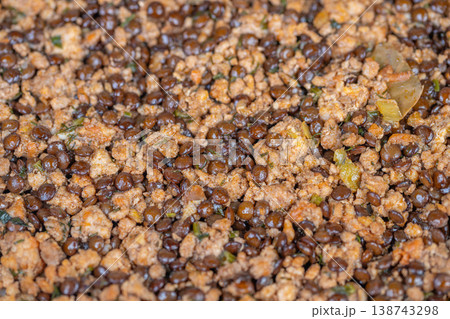 Hearty minced lentils simmered. Rustic lentil and minced meat stew with aromatic spices. Homestyle simmered lentils combined with seasoned ground meat and flavorful herbs 138743298