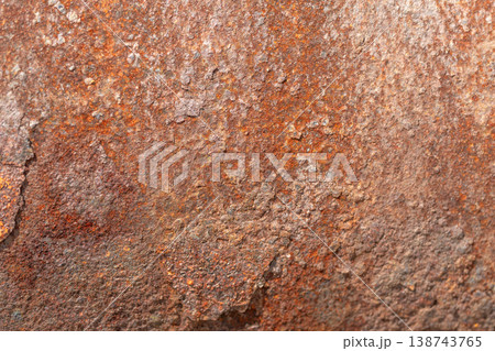 Corroded metallic sheet showcasing gritted industrial appearance and patina. Degraded rusted metal platform featuring coarse texture and weathered utilitarian aesthetic Corroded metallic sheet showcasing gritted industrial appearance and patina. Degraded rusted metal platform featuring coarse texture and weathered utilitarian aesthetic 138743765