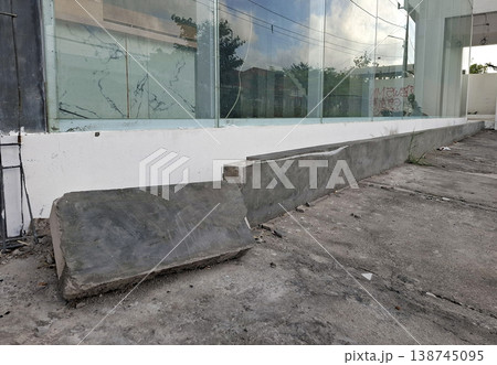 Gritty urban landscape with broken concrete and shattered glass Minimalist Melancholic Gritty urban landscape with broken concrete and shattered glass Minimalist Melancholic 138745095