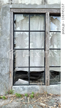 Abandoned Industrial Minimalist Scene with Broken Windows and Debris Abandoned Industrial Minimalist Scene with Broken Windows and Debris 138745157