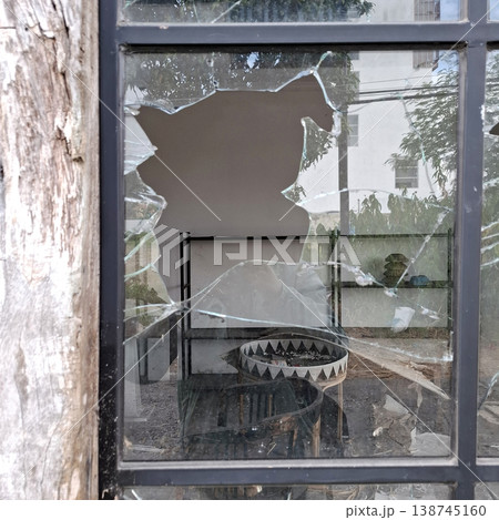 Broken Cinematic Glass Window with Gritty Mood Broken Cinematic Glass Window with Gritty Mood 138745160