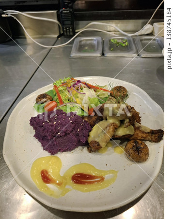 Plate of Chicken, Salad, and Purple Mash 138745184