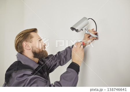 Focused Technician Installing Cctv At Home Or Office 138746641