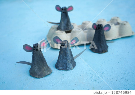 A family of mice, hand-made from a cardboard egg box. An eco-friendly idea for reuse, decorations for Easter, a gift for dad, mom, on family day. A family of mice, hand-made from a cardboard egg box. An eco-friendly idea for reuse, decorations for Easter, a gift for dad, mom, on family day. 138746984