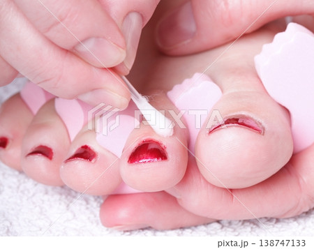 female feet red polished nails female feet red polished nails 138747133