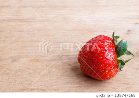 Red fresh strawberry fruit on wooden table. Red fresh strawberry fruit on wooden table. 138747169