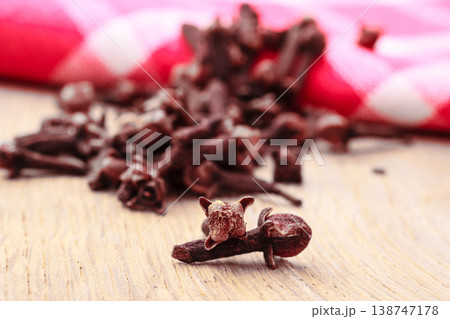Spice cloves on kitchen table Spice cloves on kitchen table 138747178