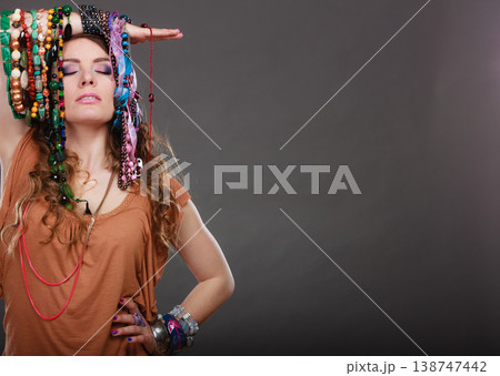 Pretty woman with jewelry necklaces bracelets Pretty woman with jewelry necklaces bracelets 138747442
